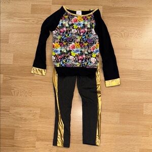 Black and Gold Outfit with Metallic Accents